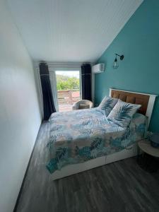 Postel nebo postele na pokoji v ubytování La Casita Ilohë