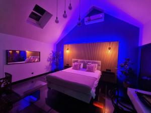 Postel nebo postele na pokoji v ubytování Suite Wellness