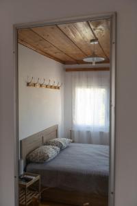 A bed or beds in a room at SOFIA'S HOUSE