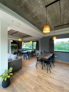 a dining room with a table and chairs at Rockaway Apart in Miramar