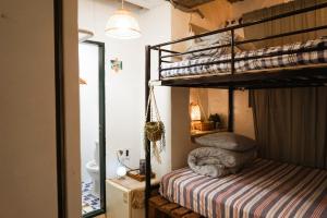 a bedroom with two bunk beds and a mirror at Space ARA in Seoul