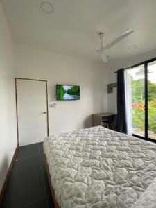 Postel nebo postele na pokoji v ubytování Toucan home