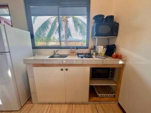 Kuchyň nebo kuchyňský kout v ubytování TVH LODGE MOOREA accès mer FARE HO'E + 6 fotografií
