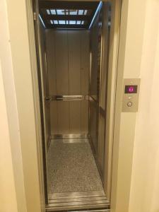 an elevator in a building with the door open at Cerca Trova in San Rafael