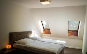 Postel nebo postele na pokoji v ubytování A7 Apartments