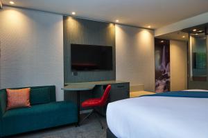 Μια τηλεόραση ή/και κέντρο ψυχαγωγίας στο Millennium Hotel Rotorua