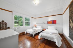 Postel nebo postele na pokoji v ubytování Sunrise House