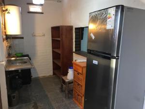 Η κουζίνα ή μικρή κουζίνα στο El Gran Tacú - El Descanso