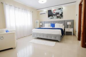 Postel nebo postele na pokoji v ubytování Luxury Penthouse