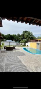 Het zwembad bij of vlak bij Espaço Prime SLZ