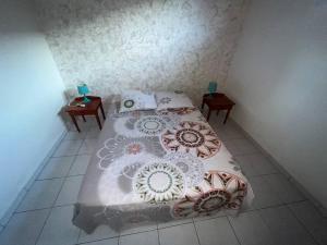 Postel nebo postele na pokoji v ubytování Le Jasmin - Résidence la ROXELLE
