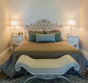 Postel nebo postele na pokoji v ubytování Qalaalti Hotel & Spa