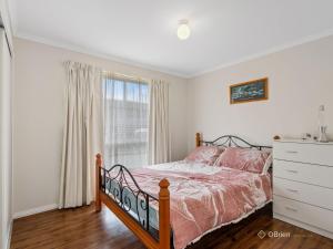 Ένα ή περισσότερα κρεβάτια σε δωμάτιο στο Boonderabbi Family and Friends Retreat