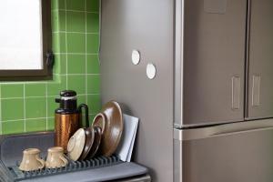Virtuve vai virtuves zona naktsmītnē 【湯布院の山小屋】サンクラウド・ヒュッテ