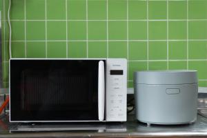 Virtuve vai virtuves zona naktsmītnē 【湯布院の山小屋】サンクラウド・ヒュッテ
