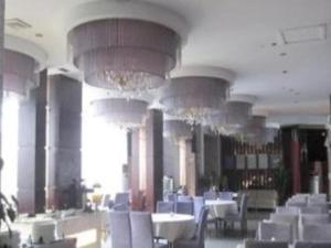 Restorāns vai citas vietas, kur ieturēt maltīti, naktsmītnē Biway Fashion Hotel - Puyang Lianhua