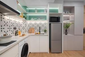 Η κουζίνα ή μικρή κουζίνα στο Adoor Suites Shenzhen