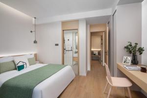 Ένα ή περισσότερα κρεβάτια σε δωμάτιο στο Adoor Suites Shenzhen