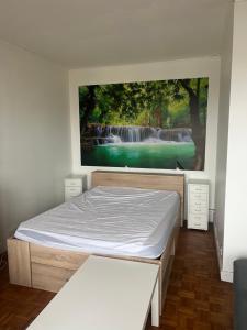 Postel nebo postele na pokoji v ubytování Cocooning près de Paris, parc des expos Villepinte et aéroport CDG