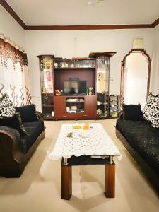 Posezení v ubytování Legacy homestay