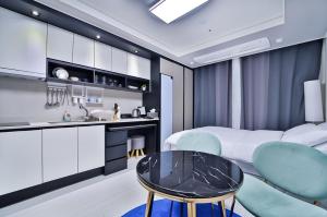 A kitchen or kitchenette at Moon Stay Star BnB
