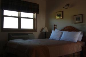 Ein Bett oder Betten in einem Zimmer der Unterkunft Smith Rock Chalets