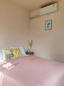 A bed or beds in a room at Payim farmstay