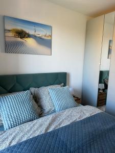 Postel nebo postele na pokoji v ubytování Apartament nr 14 Łeba