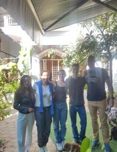 a group of people posing for a picture at Bloom Garden Bed & Breakfast in Siem Reap