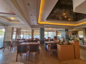 Restoran atau tempat lain untuk makan di Perlo Hotel City