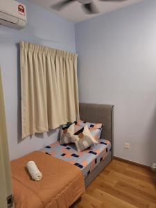 Ένα ή περισσότερα κρεβάτια σε δωμάτιο στο ZnZ Homestay Ostia Bangi Netflix +12 φωτογραφίες