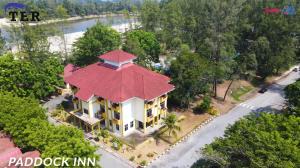 an overhead view of a house with a red roof at TERENGGANU EQUESTRIAN RESORT (PADDOCK INN) in Kuala Terengganu