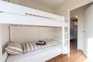 Postel nebo postele na pokoji v ubytování NEW - De sheeper - 10Personen - 5slaapkamers - Sauna - Jacuzzi