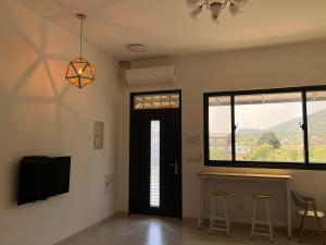 TV a/nebo společenská místnost v ubytování 楠山民宿Nanshan Homestay