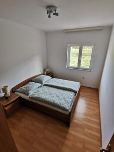 Vuode tai vuoteita majoituspaikassa Appartement Ivo