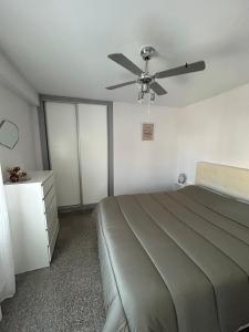 Postel nebo postele na pokoji v ubytování Terraza Albir