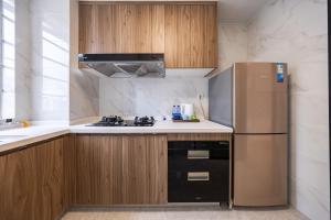 Una cocina o zona de cocina en 岗厦汇花园行政公寓酒店-深圳福田会展中心岗厦地铁站店