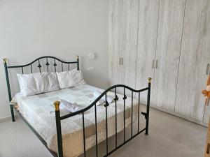 Postel nebo postele na pokoji v ubytování NAVSIKA LUXURY APARTMENT