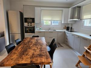 Kuchyň nebo kuchyňský kout v ubytování NAVSIKA LUXURY APARTMENT
