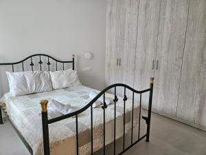 Postel nebo postele na pokoji v ubytování NAVSIKA LUXURY APARTMENT