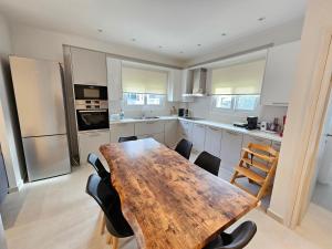Kuchyň nebo kuchyňský kout v ubytování NAVSIKA LUXURY APARTMENT
