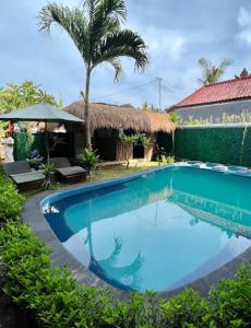 The swimming pool at or close to Grace Paradise Guest House