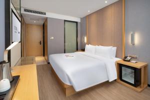 Fotografie z fotogalerie ubytování Yizhi Hotel the Pearl River New Town Tiyu West Road Subway Station 宜致酒店-体育西路地铁站店 v Kantonu
