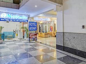 a lobby of a hotel with a hotel museum at The Grand Hotel Akshay in Gurgaon