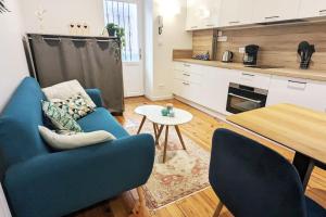 Kuchyň nebo kuchyňský kout v ubytování Cosy Olympe - T2 - Quartier des halles