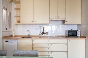 A kitchen or kitchenette at AT301 Apartamento a pocos metros de la playa de Altafulla