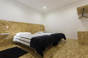 Postel nebo postele na pokoji v ubytování Quinta das Rosas Villas + 37 fotografií