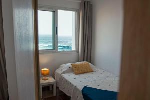 Ένα ή περισσότερα κρεβάτια σε δωμάτιο στο CASA CALMA Reviva Canarias