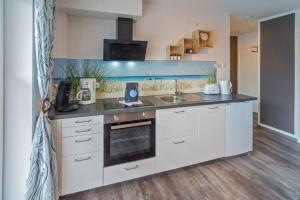 Kuchyň nebo kuchyňský kout v ubytování Traum-Wohnung-4-mit-Balkon