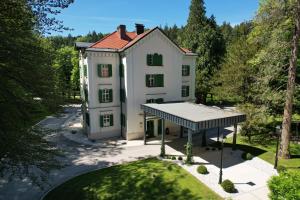 an aerial view of a house with a roof at Boutique Hotel Dobrna - Terme Dobrna in Dobrna